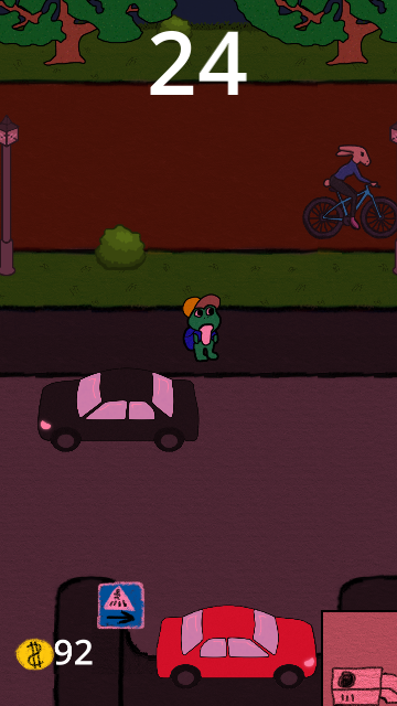 Lippispäinen sammakko on jalkakäytävällä puiston ja tien välissä